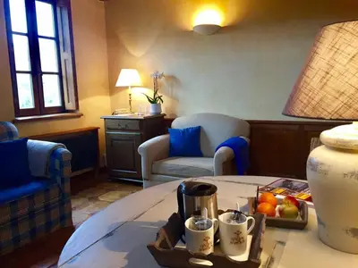 Coin salon dans l'établissement Le Hameau de Barboron