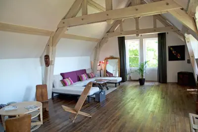 Télévision ou salle de divertissement dans l'établissement La Maison de l'Escargot