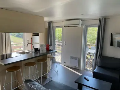 Cuisine ou kitchenette dans l'établissement Les Lodges