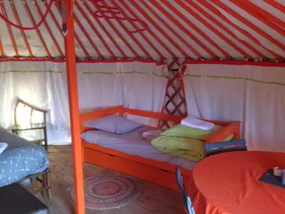 Un ou plusieurs lits dans un hébergement de l'établissement Yourte Mongole