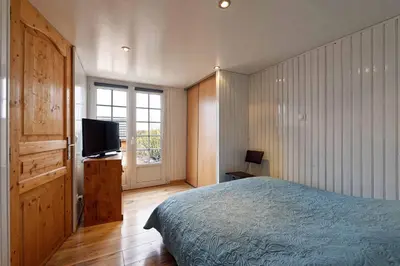 Un ou plusieurs lits dans un hébergement de l'établissement Chambres d'hotes à Autun
