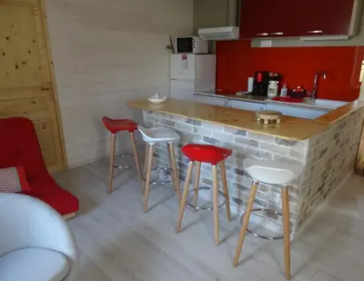 Cuisine ou kitchenette dans l'établissement LA BELLE D'ANTAN