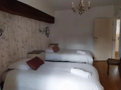 Un ou plusieurs lits dans un hébergement de l'établissement La Maison des Maîtres de Forge