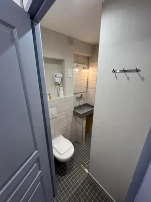 Salle de bains dans l'établissement Nouvel Hotel