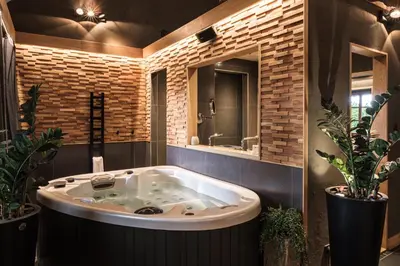 Salle de bains dans l'établissement Le Domaine des Prés Verts Suites & Chambres avec Jacuzzi Privatif à Châteauneuf