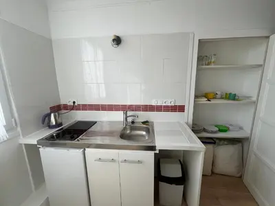 Cuisine ou kitchenette dans l'établissement Aux Quatre Vents