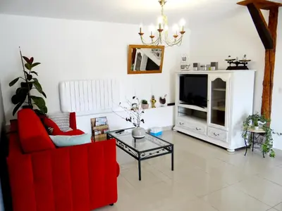 Coin salon dans l'établissement Gîte L'étable
