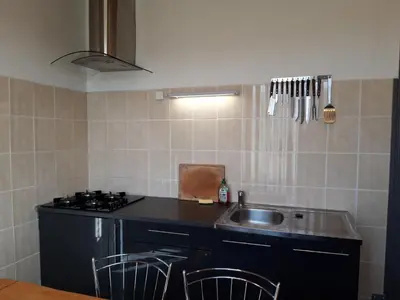 Cuisine ou kitchenette dans l'établissement Les Buissonnets