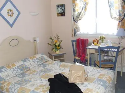 Un ou plusieurs lits dans un hébergement de l'établissement Hôtel de la Poste