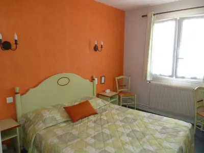 Un ou plusieurs lits dans un hébergement de l'établissement Hôtel de la Poste