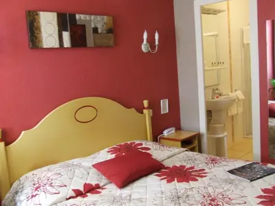 Un ou plusieurs lits dans un hébergement de l'établissement Hôtel de la Poste