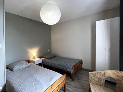 Un ou plusieurs lits dans un hébergement de l'établissement Le clos des terres de bousson