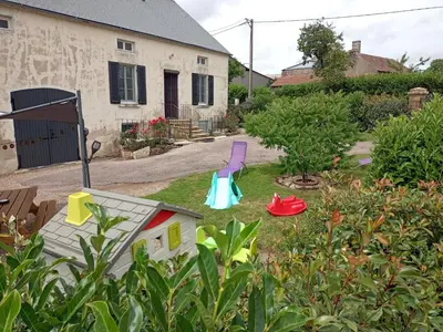 Jardin de l'établissement Gite du moulin à la ferme pour 6 á 8 pers tt confort