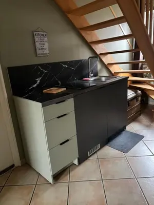 Cuisine ou kitchenette dans l'établissement Maison d’izier