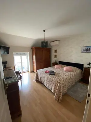 Un ou plusieurs lits dans un hébergement de l'établissement Maison d’izier
