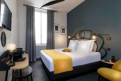 Un ou plusieurs lits dans un hébergement de l'établissement Hotel Saint Regis