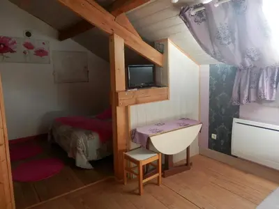Un ou plusieurs lits dans un hébergement de l'établissement Chambres d'Hôtes Roseland