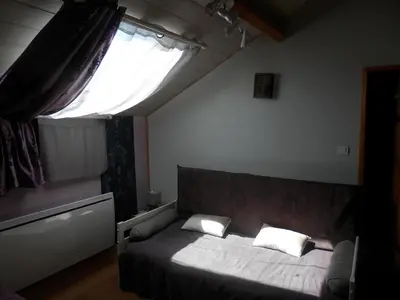 Un ou plusieurs lits dans un hébergement de l'établissement Chambres d'Hôtes Roseland