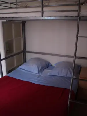 Un ou plusieurs lits dans un hébergement de l'établissement Studio Dijon entre fac hopital et centre