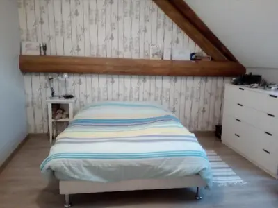 Un ou plusieurs lits dans un hébergement de l'établissement Chambres chez l habitant
