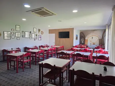 Télévision ou salle de divertissement dans l'établissement Hotel Saint Odilon