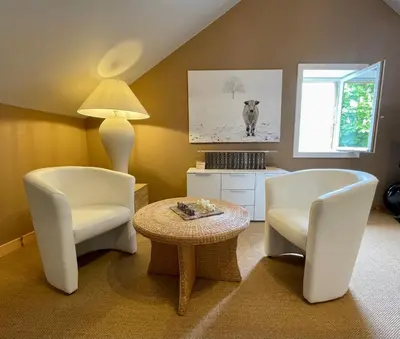 Coin salon dans l'établissement Chambres d'Hôte Le Clos de L'Argolay