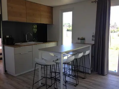 Cuisine ou kitchenette dans l'établissement Le Lodge Premium