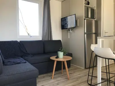Cuisine ou kitchenette dans l'établissement Le Lodge Premium