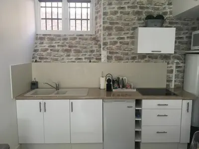 Cuisine ou kitchenette dans l'établissement Studio Clémenceau