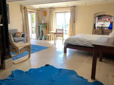 Un ou plusieurs lits dans un hébergement de l'établissement Vineyard Garden Studio