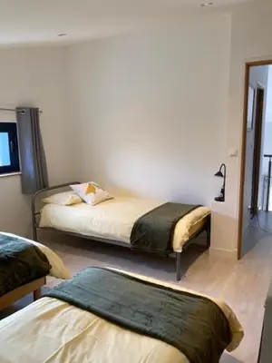 Un ou plusieurs lits dans un hébergement de l'établissement Atelier 2 - for 6 people with shared pool