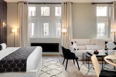 Un ou plusieurs lits dans un hébergement de l'établissement Maison des Ducs