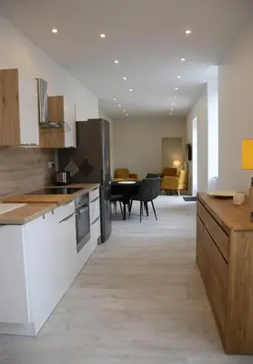 Cuisine ou kitchenette dans l'établissement La Maison de Jules