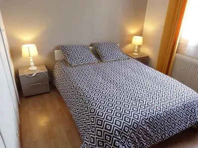 Un ou plusieurs lits dans un hébergement de l'établissement Chez Jeannette