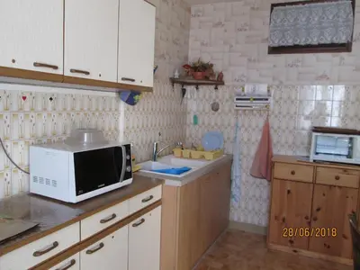 Cuisine ou kitchenette dans l'établissement GITE A SAINT-REMY (21500)