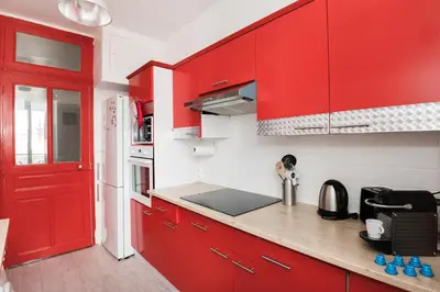 Cuisine ou kitchenette dans l'établissement Le Devosge