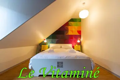 Un ou plusieurs lits dans un hébergement de l'établissement APPARTEMENT LE VITAMINE - topbnb dijon