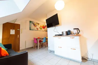 Cuisine ou kitchenette dans l'établissement APPARTEMENT LE VITAMINE - topbnb dijon