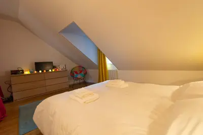 Un ou plusieurs lits dans un hébergement de l'établissement APPARTEMENT LE VITAMINE - topbnb dijon