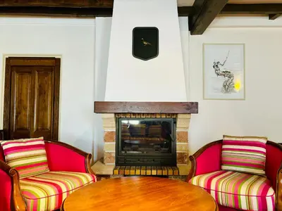 Coin salon dans l'établissement Hôtel Losset