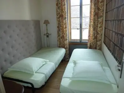 Un ou plusieurs lits dans un hébergement de l'établissement Appartements de la Cote 6
