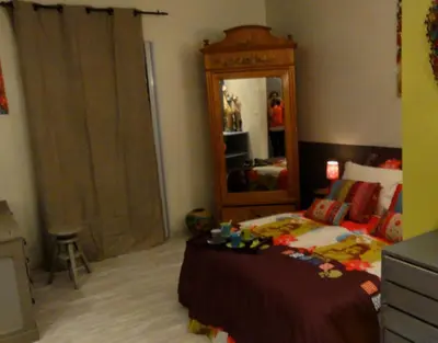 Un ou plusieurs lits dans un hébergement de l'établissement Chambre d'hôtes Au Fil de l'Eau