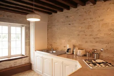 Cuisine ou kitchenette dans l'établissement Gîte Design