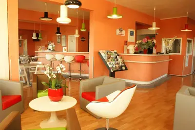 Coin salon dans l'établissement Hotel Val Vert