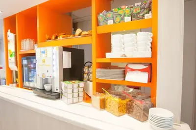 Cuisine ou kitchenette dans l'établissement Première Classe Dijon Nord - Zénith