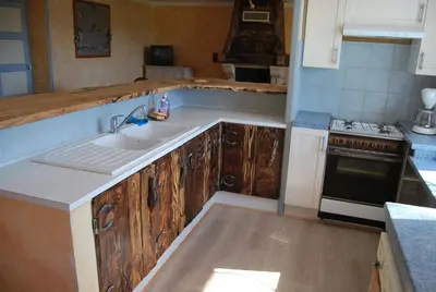 Cuisine ou kitchenette dans l'établissement Gîte