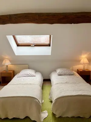 Un ou plusieurs lits dans un hébergement de l'établissement Domaine Les Hauts Prés