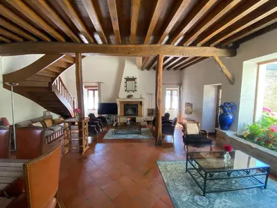 Coin salon dans l'établissement Domaine Les Hauts Prés