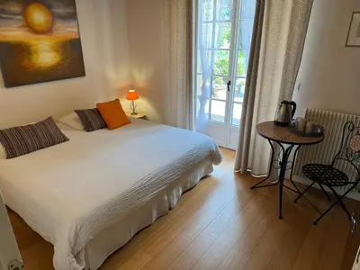 Un ou plusieurs lits dans un hébergement de l'établissement Maison d'hôtes Fleurs de Vignes