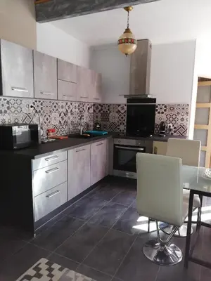 Cuisine ou kitchenette dans l'établissement Rose dor